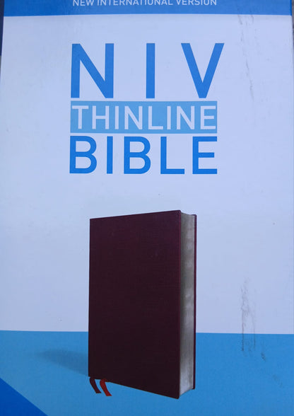 NIV, Thinline Bible, Bonded Leather, Burgundy, Red Letter, Comfort Print (Old Stock, box with minor markings)